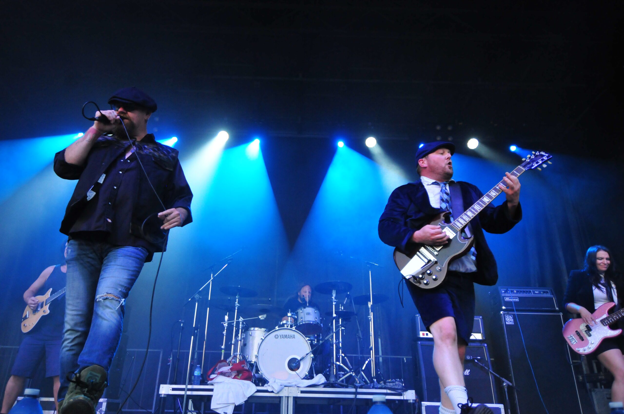 Members of the AC/DC Tribute Band High Voltage performing at Penticton Peach Festival.