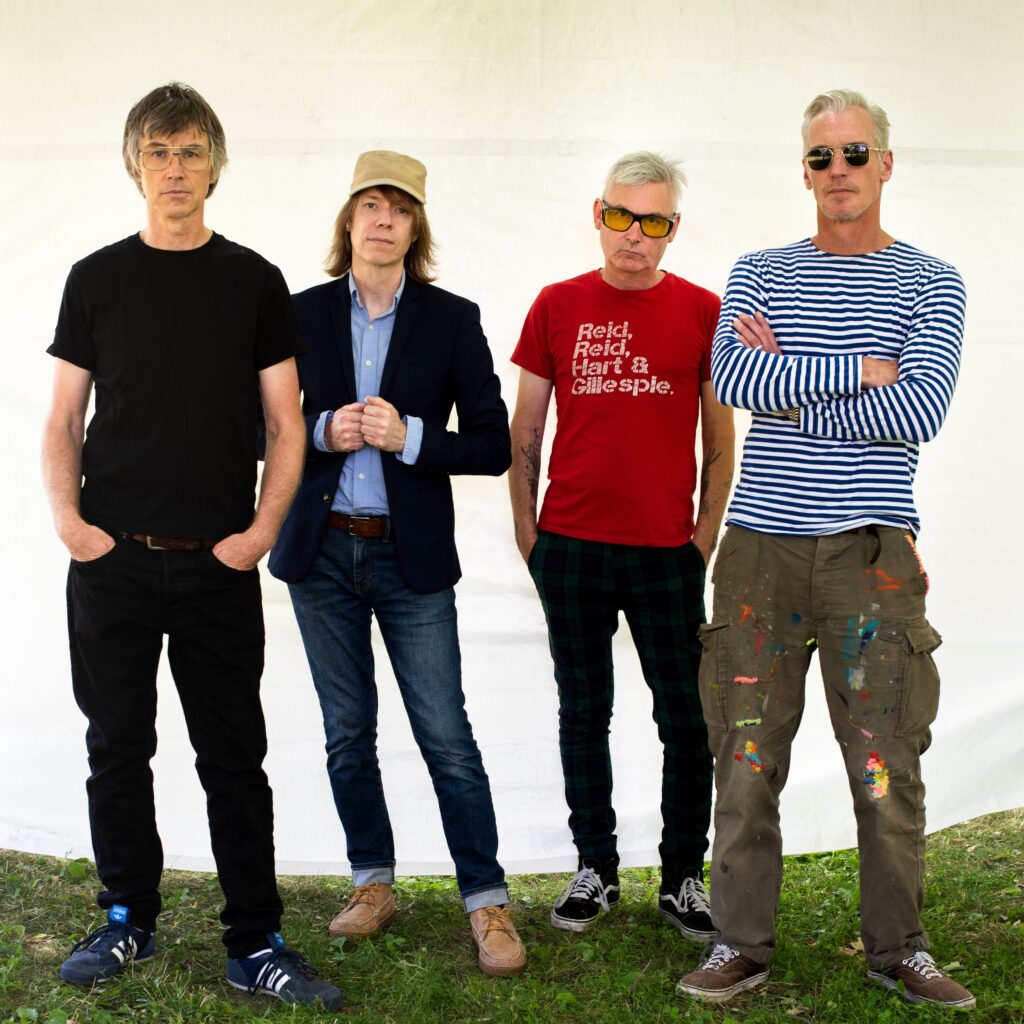 The four members of the band Sloan standing side-by-side.